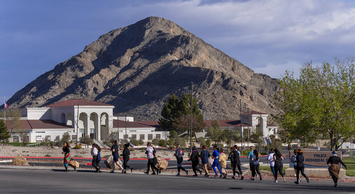 Attendees take a short warm up run before working out and learning defensive tactics with the M ...