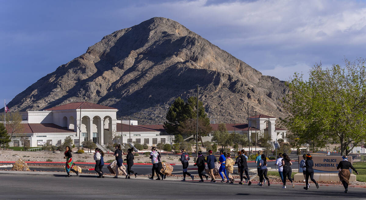 Attendees take a short warm up run before working out and learning defensive tactics with the M ...