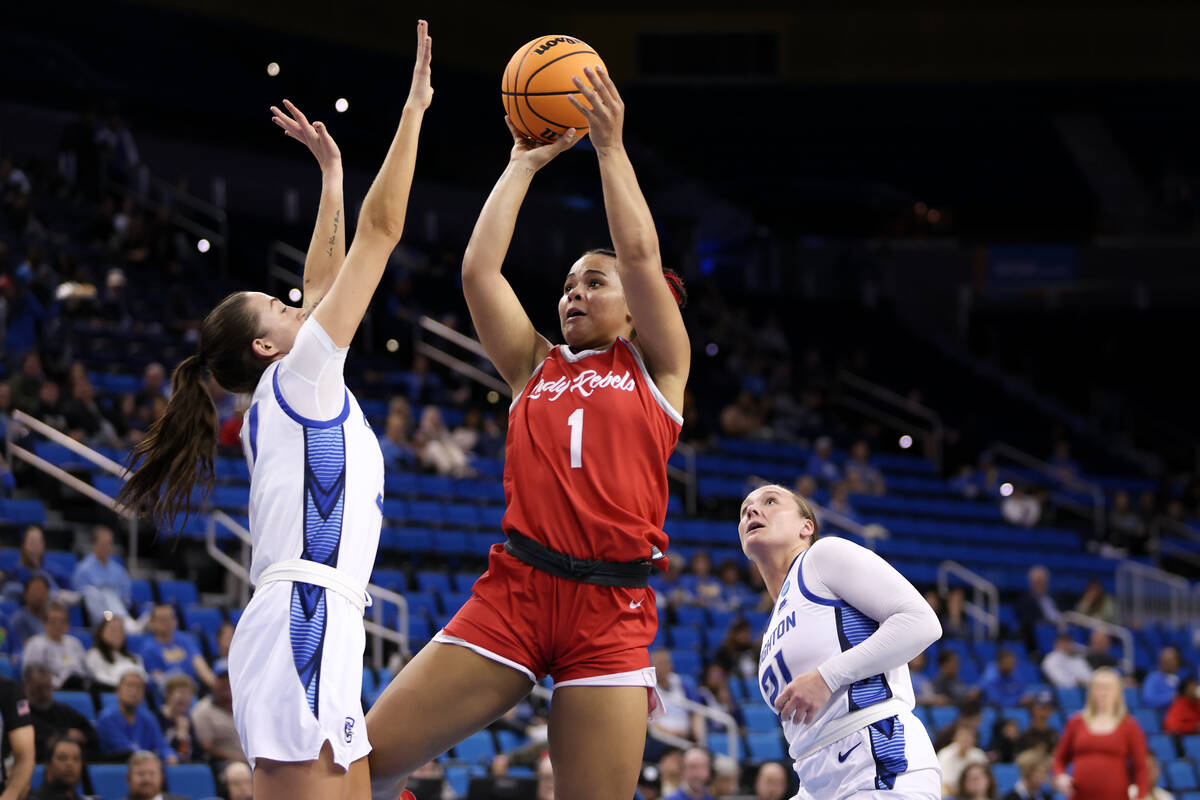 UNLV Lady Rebels forward Nneka Obiazor (1) shoots against Creighton Bluejays forward Emma Ronsi ...