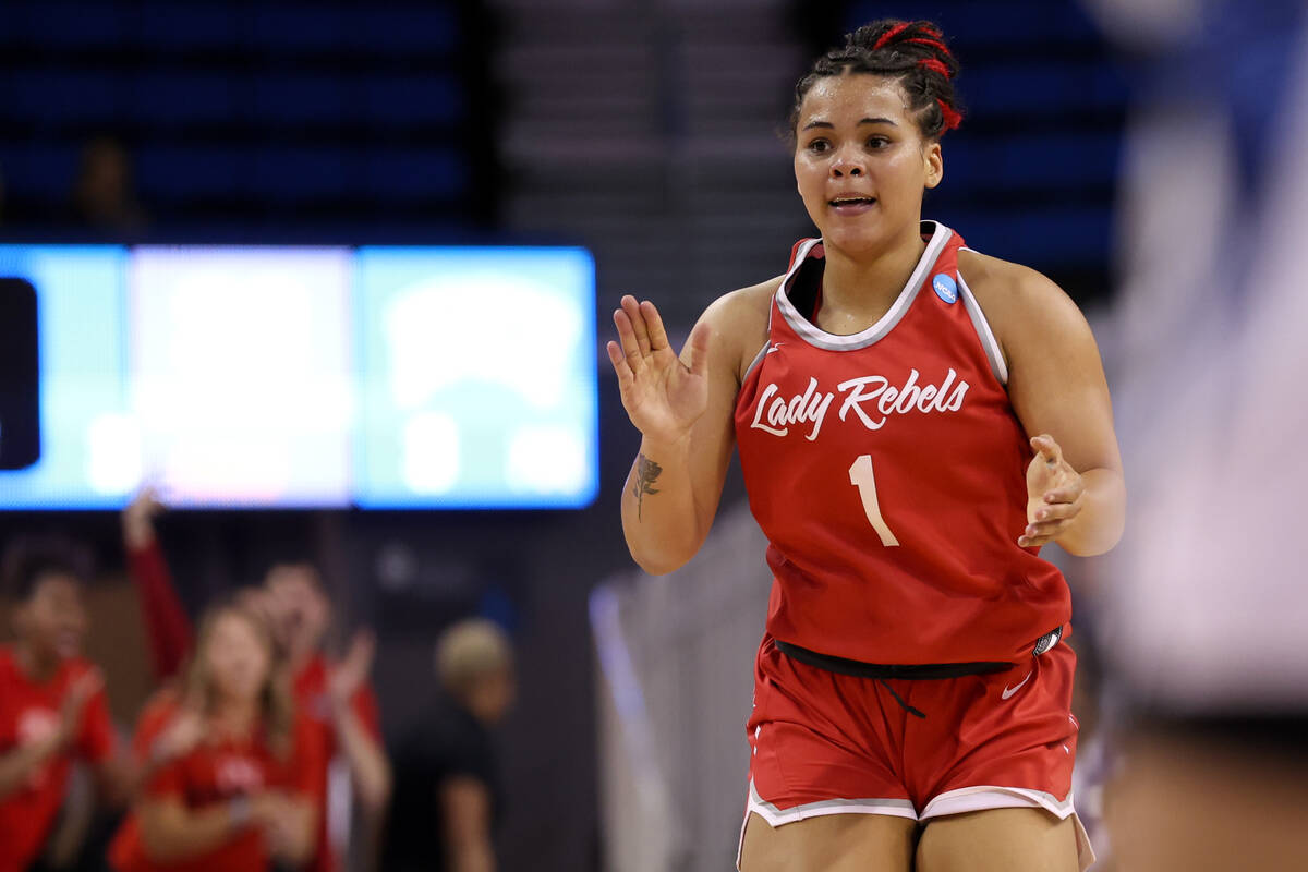 UNLV Lady Rebels forward Nneka Obiazor (1) claps after scoring during the first half of a first ...