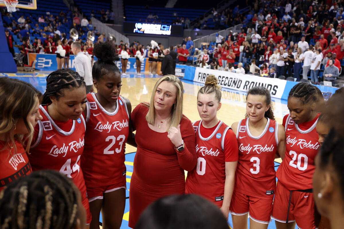 UNLV Lady Rebels head coach Lindy La Rocque gathers her team after they lost a first-round coll ...