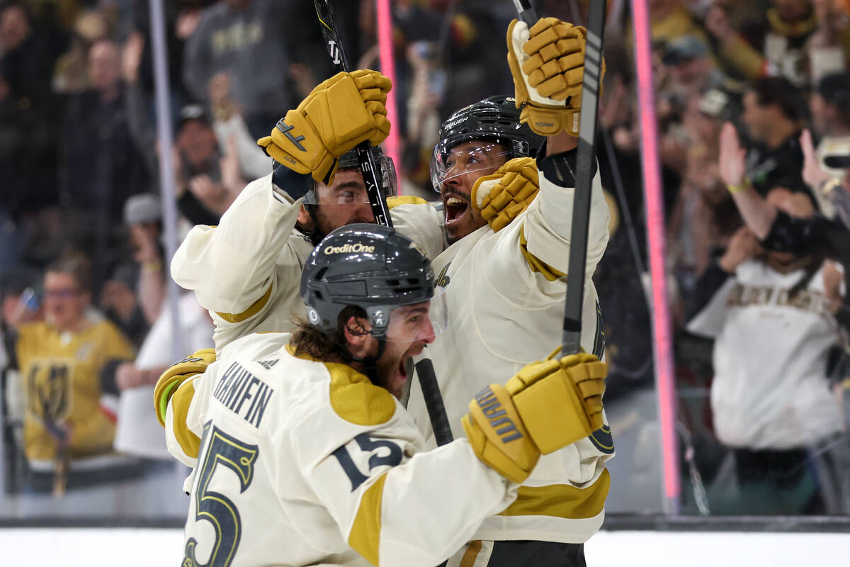 Golden Knights center Nicolas Roy, left, defenseman Noah Hanifin (15) and right wing Keegan Kol ...