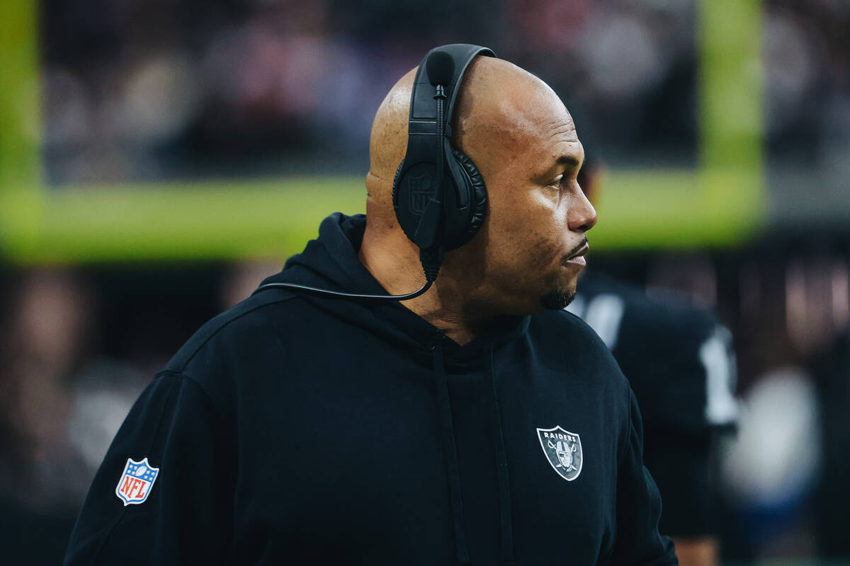 Raiders interim head coach Antonio Pierce watches his team during a game against the New York G ...