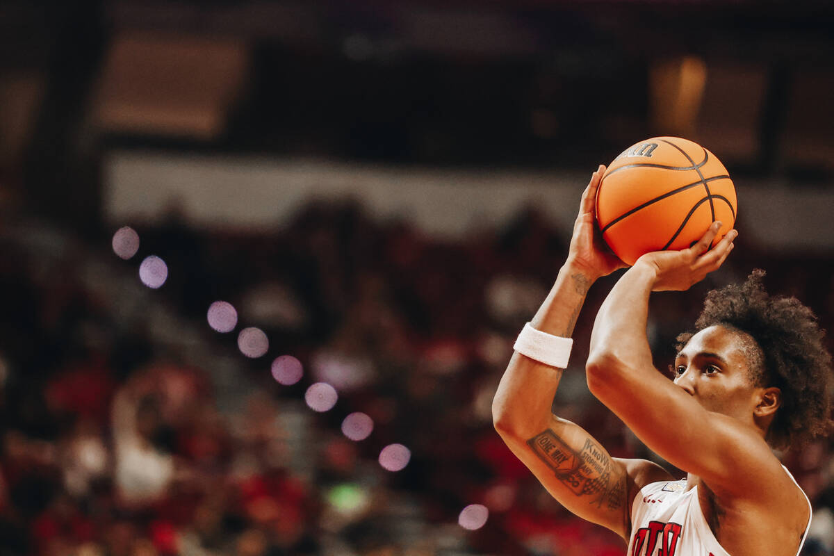 UNLV guard Shane Nowell (3) makes a free throw during a second-round NIT game between Boston Co ...