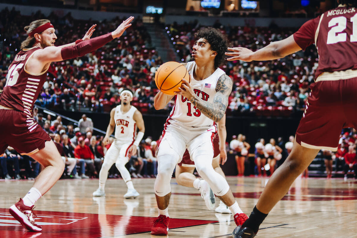 UNLV guard Brooklyn Hicks (13) eyes the basket during a second-round NIT game between Boston Co ...