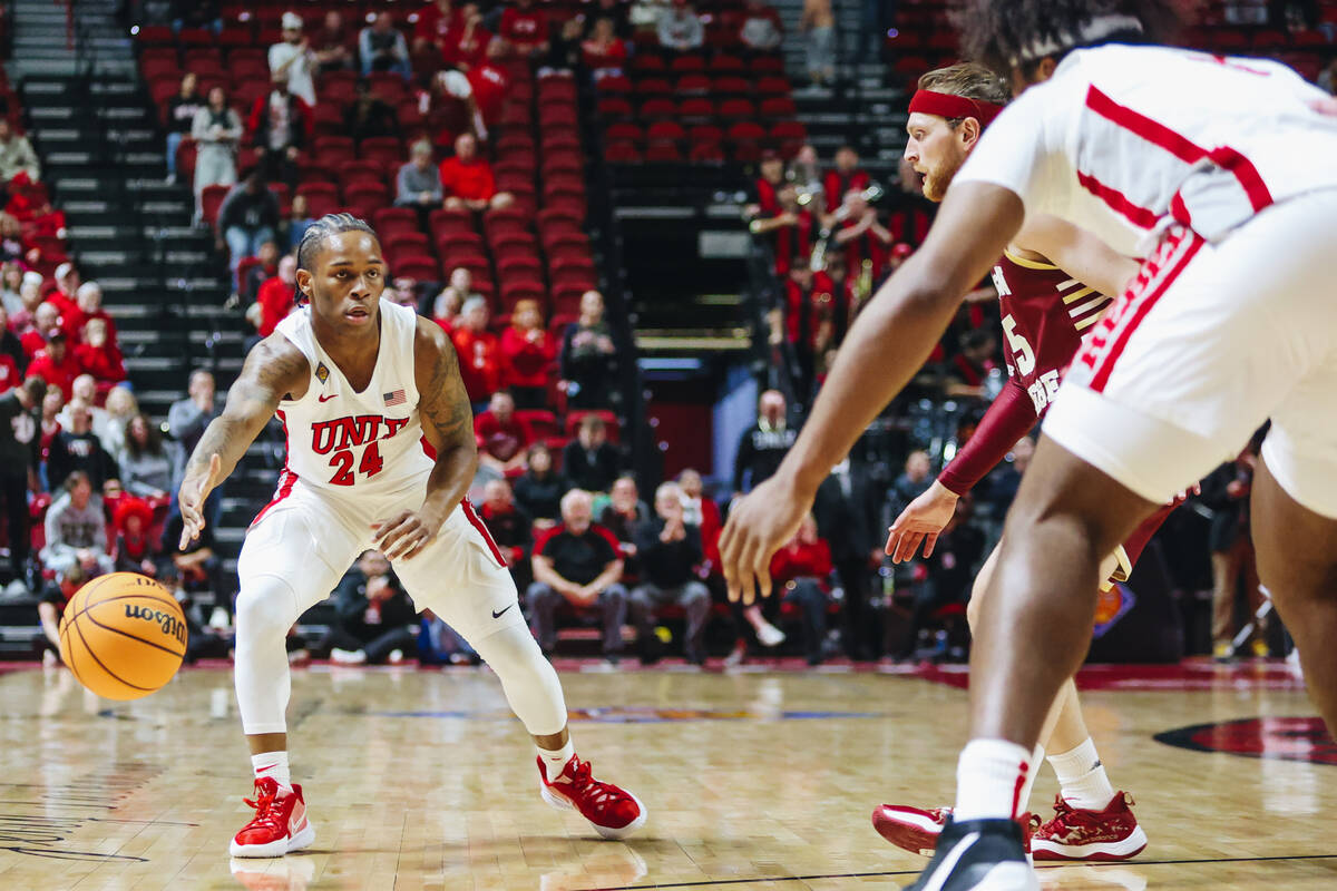 UNLV guard Jackie Johnson III (24) passes the ball to a teammate during a second-round NIT game ...