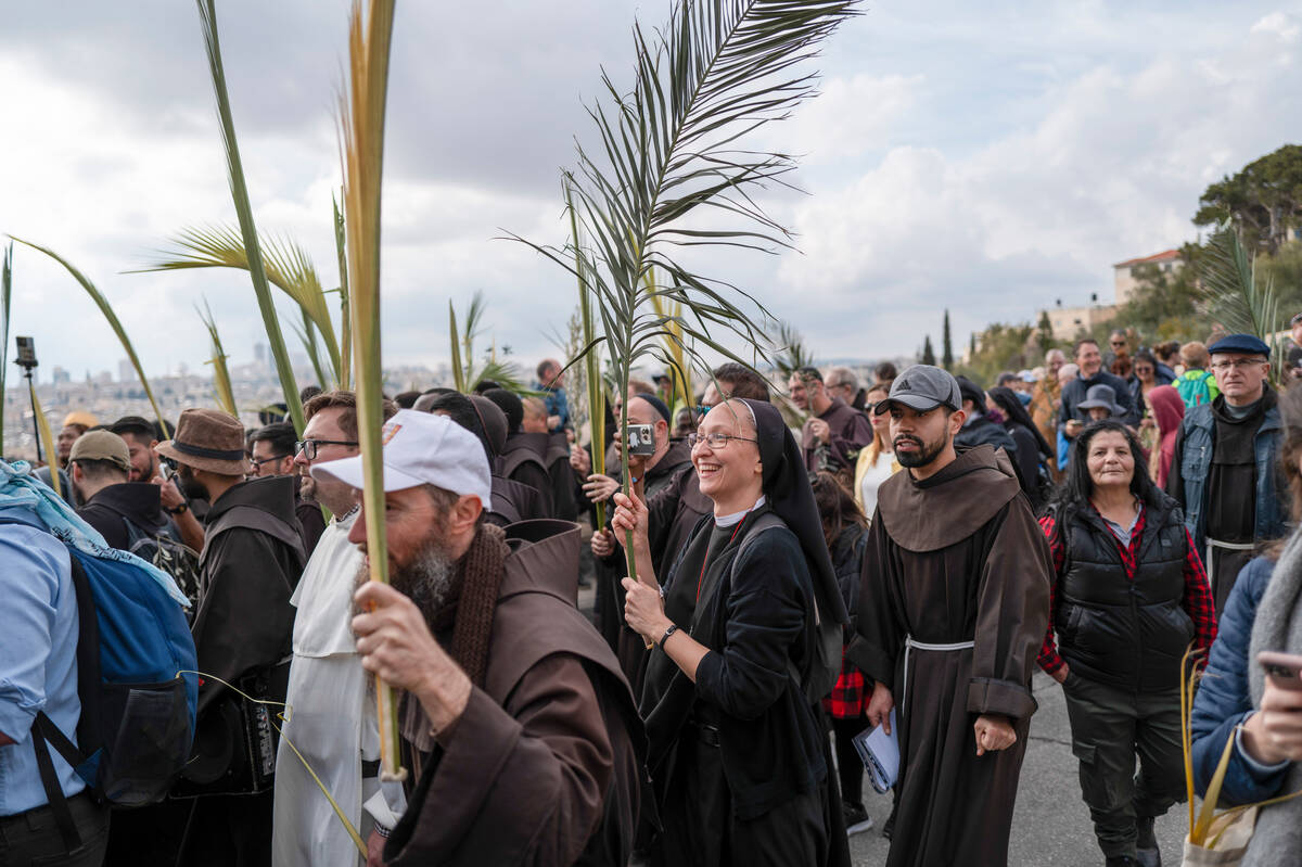 Thousands in Jerusalem fete Palm Sunday as war rages on