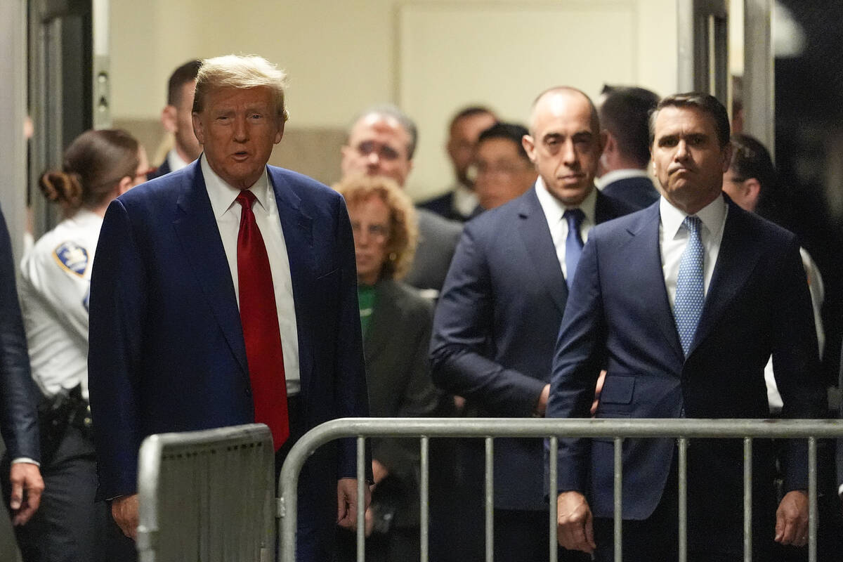 Former President Donald Trump departs Trump Tower to attend a pre-trial hearing in Manhattan cr ...