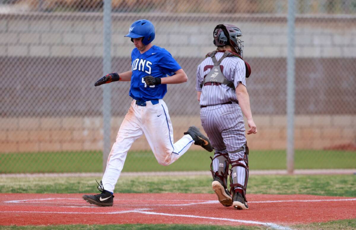 Sierra Vista baserunner Sierra Vista baserunner Ashton Mohler (49) scores as Cimarron-Memorial ...