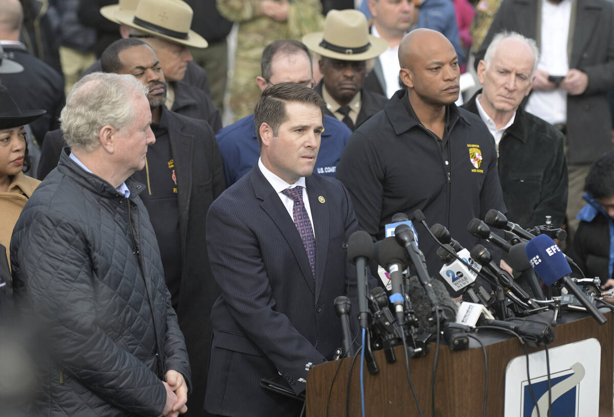 From left, Sen. Chris Van Hollen, D-Md.,; Bill DelBagno, FBI special agent in charge of the Bal ...