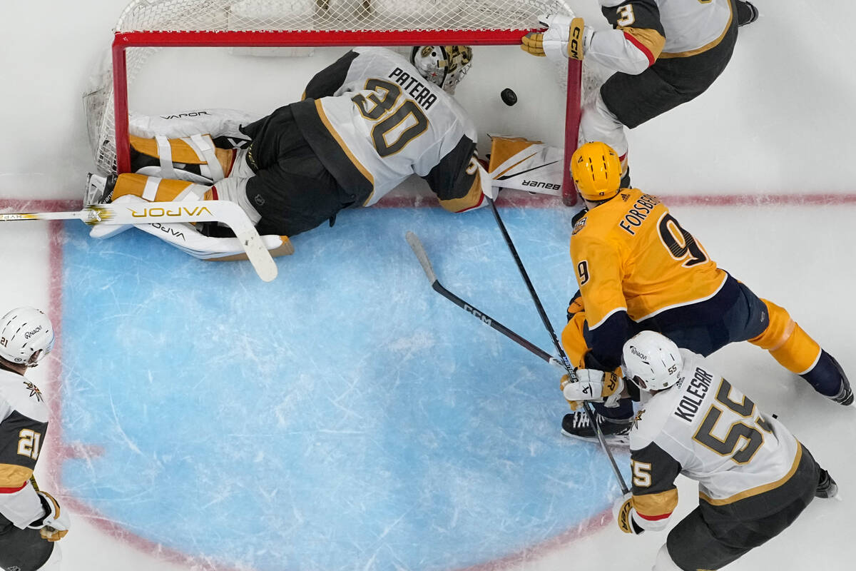 Nashville Predators left wing Filip Forsberg (9) scores a goal past Vegas Golden Knights goalte ...