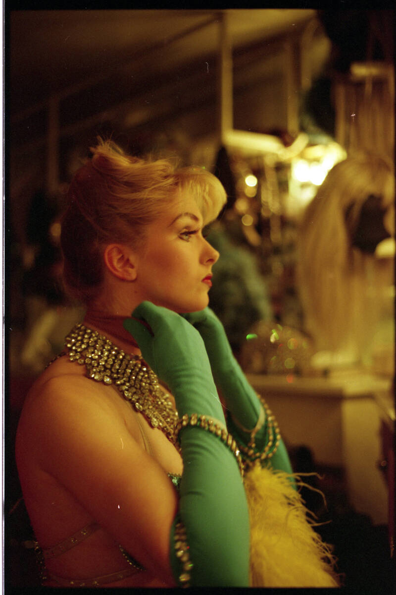 Showgirls from "Folies Bergere" getting ready for a show in their dressing room at th ...