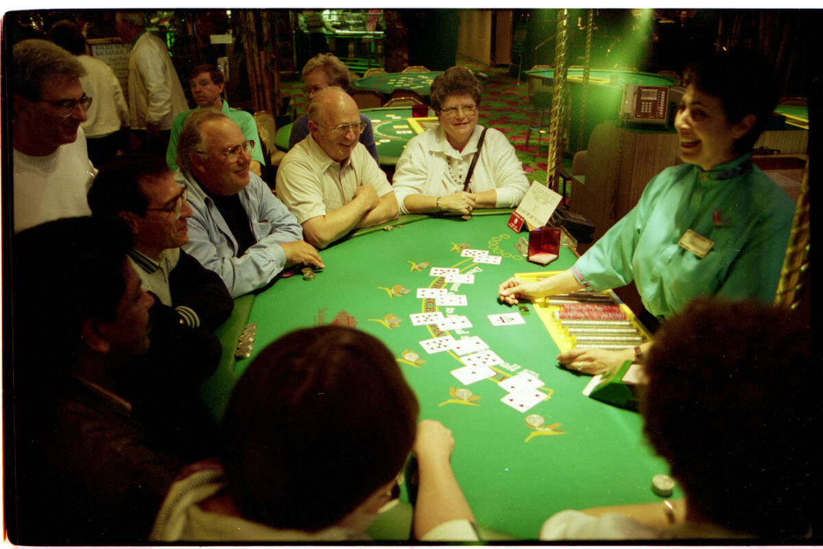 Christine Toly dealing "face-up" blackjack to tourists at the Tropicana Hotel's " ...