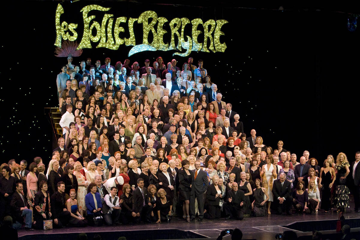 Folies Bergere alumni pose on the "golden staircase" inside the Tiffany Theater at the Tropican ...