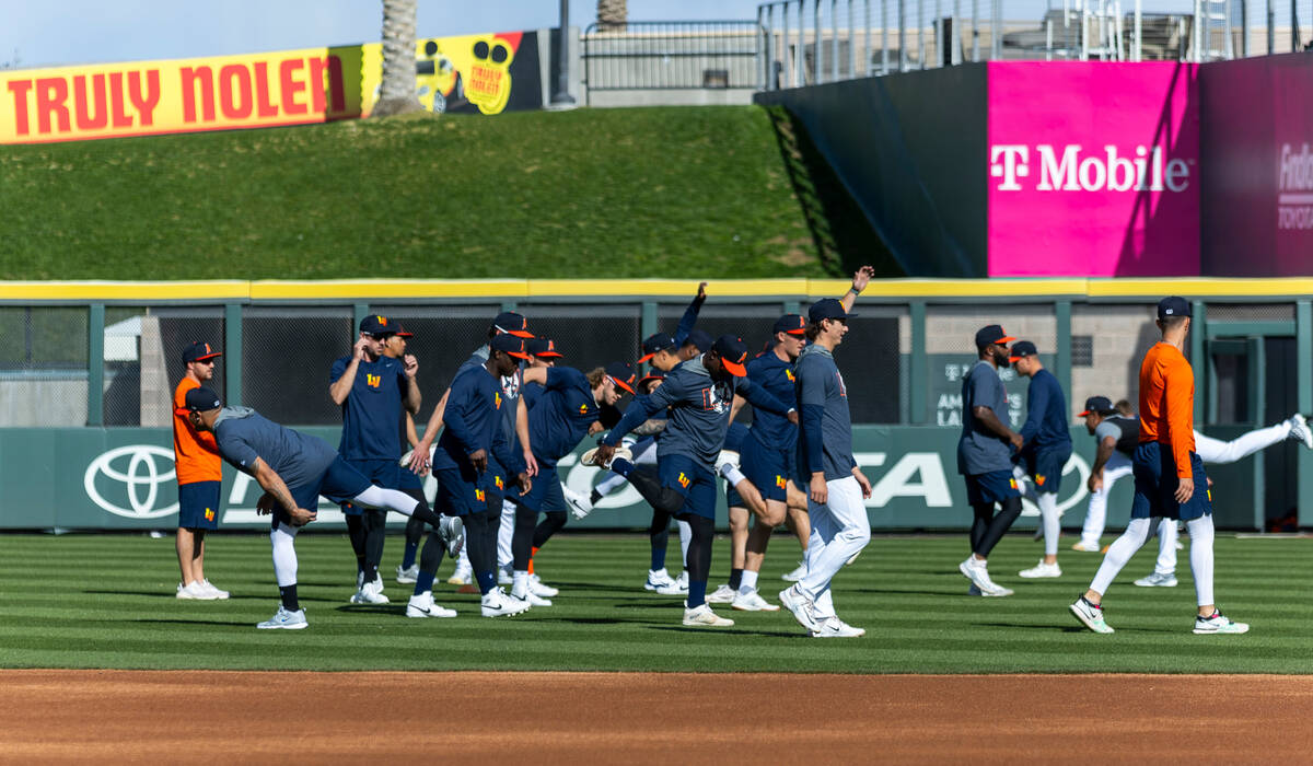 Aviators platers warm up before practice at the Las Vegas Ballpark on Tuesday, March 26, 2024, ...