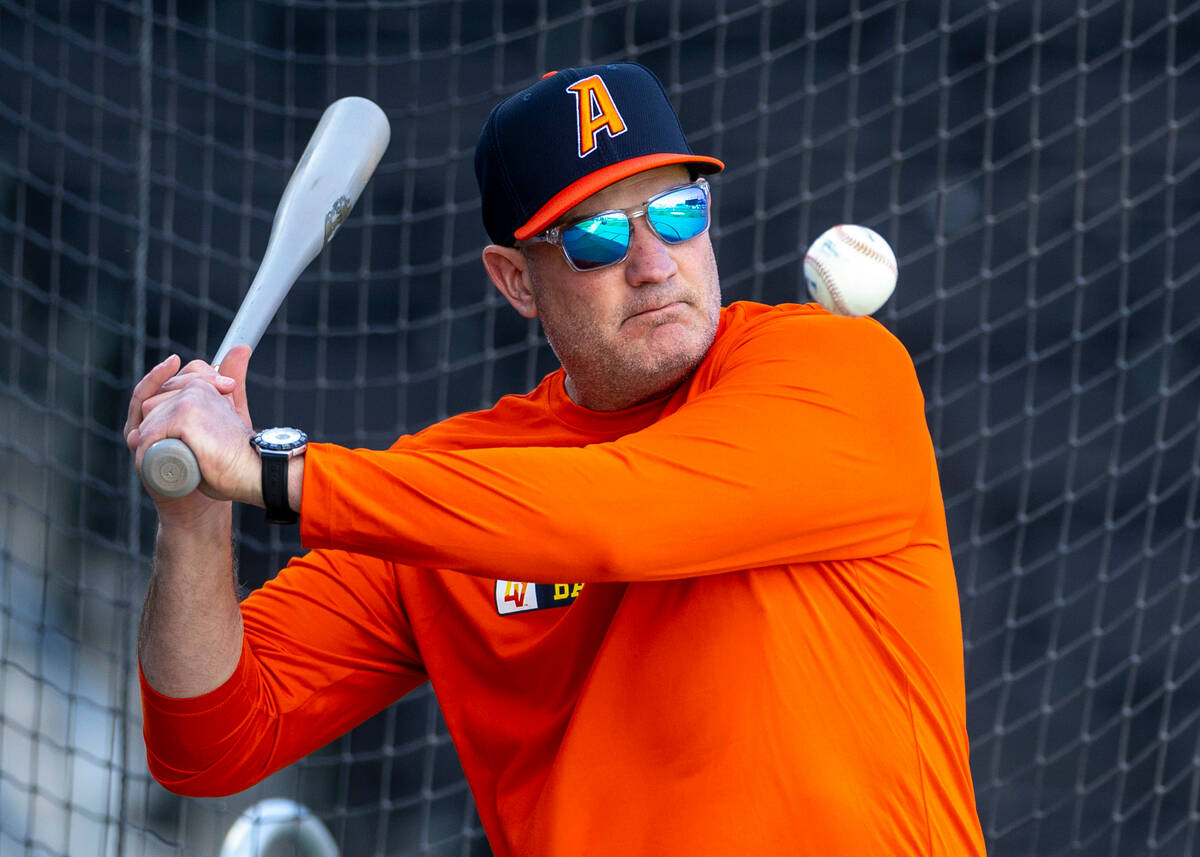 Aviators Manager Fran Riordan hits balls to the infield during practice at the Las Vegas Ballpa ...