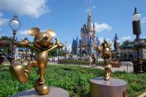 FILE - The Cinderella Castle is seen at the Magic Kingdom at Walt Disney World, July 14, 2023, ...