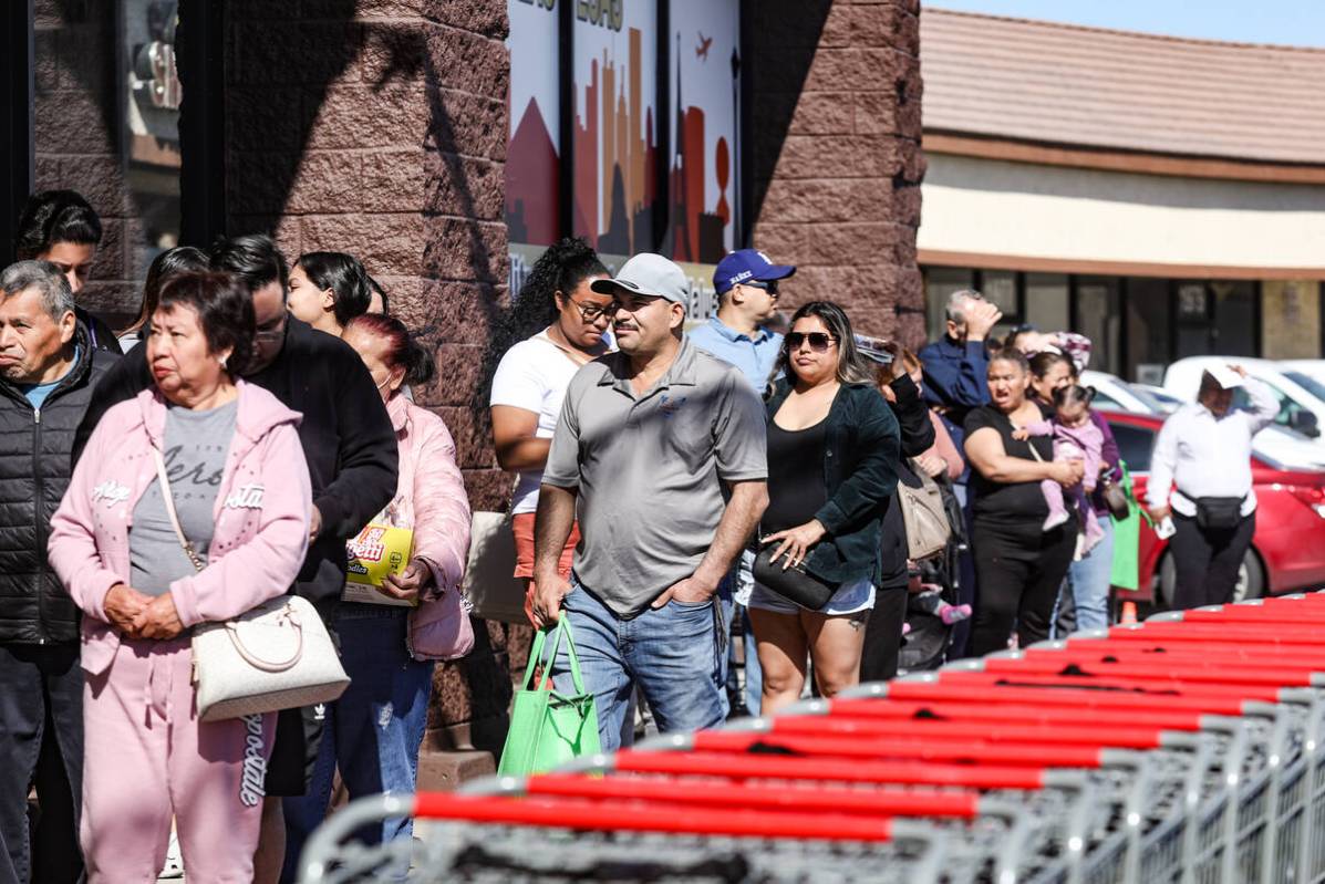 Customers line up to shop at Superior Grocers at the grand opening in East Las Vegas, Wednesday ...