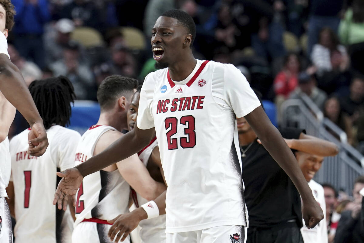 North Carolina State's Mohamed Diarra (23) celebrates after defeating Oakland in a college bask ...