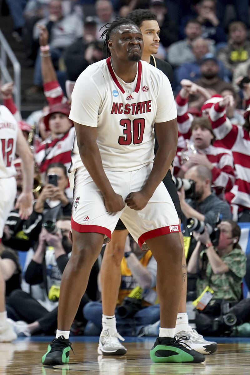 North Carolina State's DJ Burns, Jr. (30) reacts during the second half of a college basketball ...