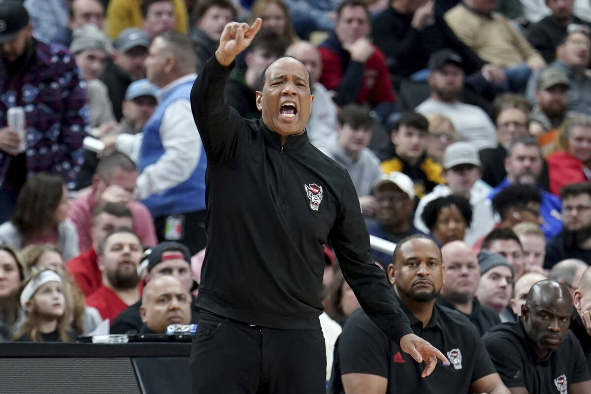 North Carolina State head coach Kevin Keatts calls out to his team during the first half of a c ...