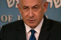 Israeli Prime Minister Benjamin Netanyahu delivers his speech after a meeting with German Chanc ...