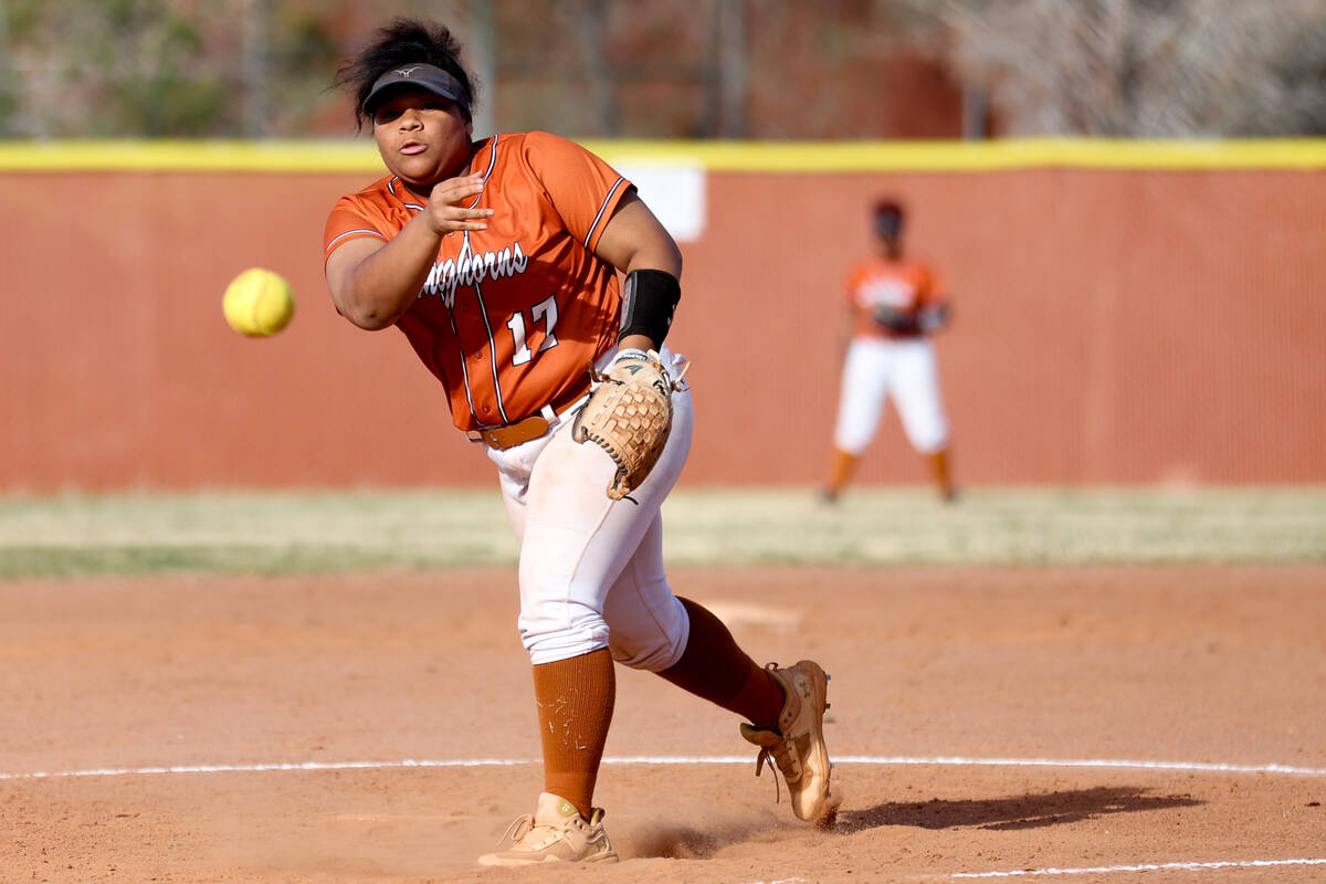 Legacy pitcher Nadia Armstrong throws to Clark during a high school softball game at Legacy Hig ...