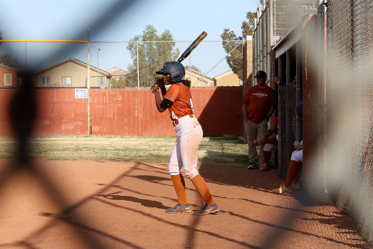 Legacy outfielder Myla Smith (4) warms up to bat during a high school softball game against Cla ...