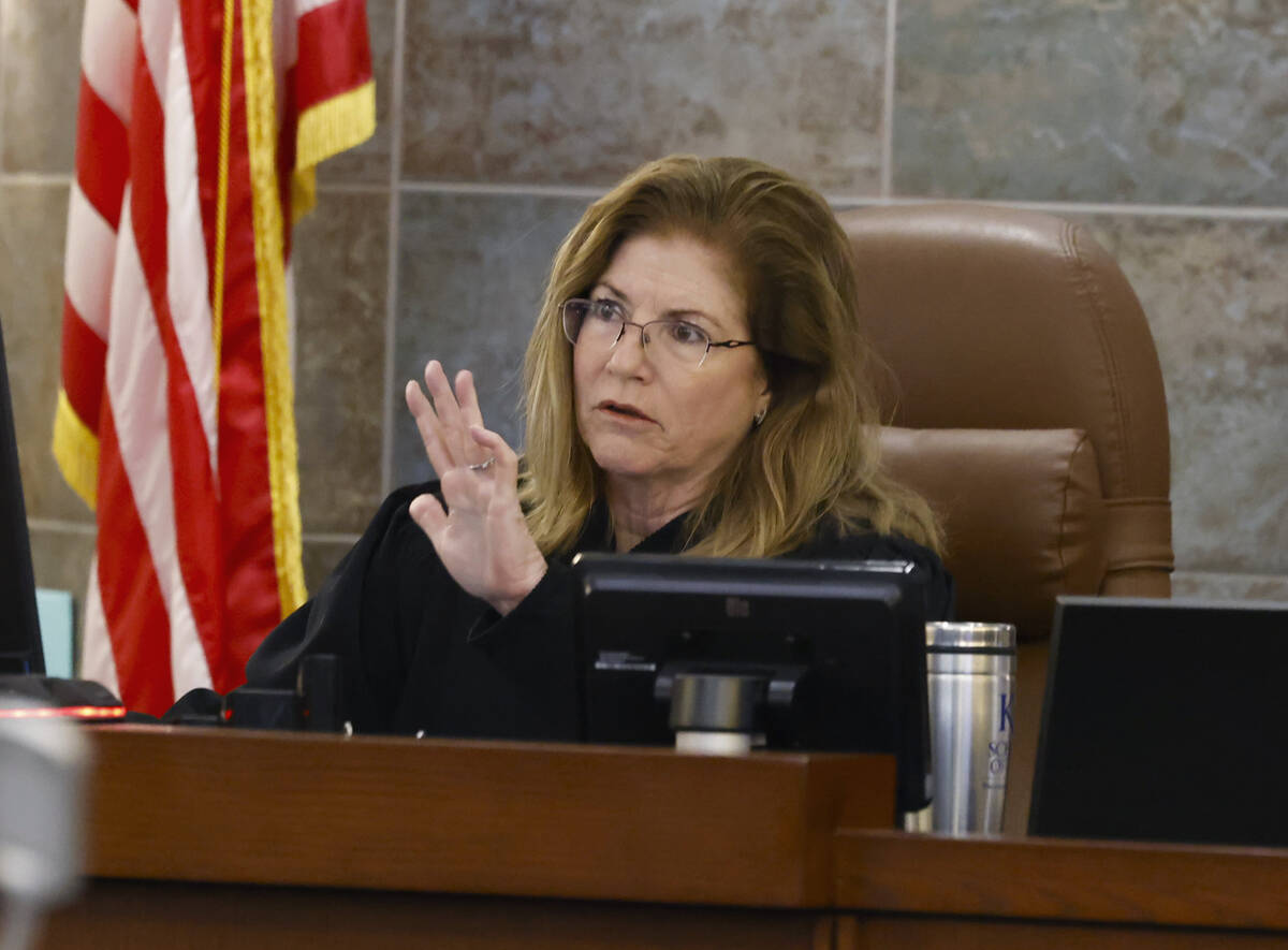 District Judge Susan Johnson presides over Deobra Redden's, who was captured on video attacking ...