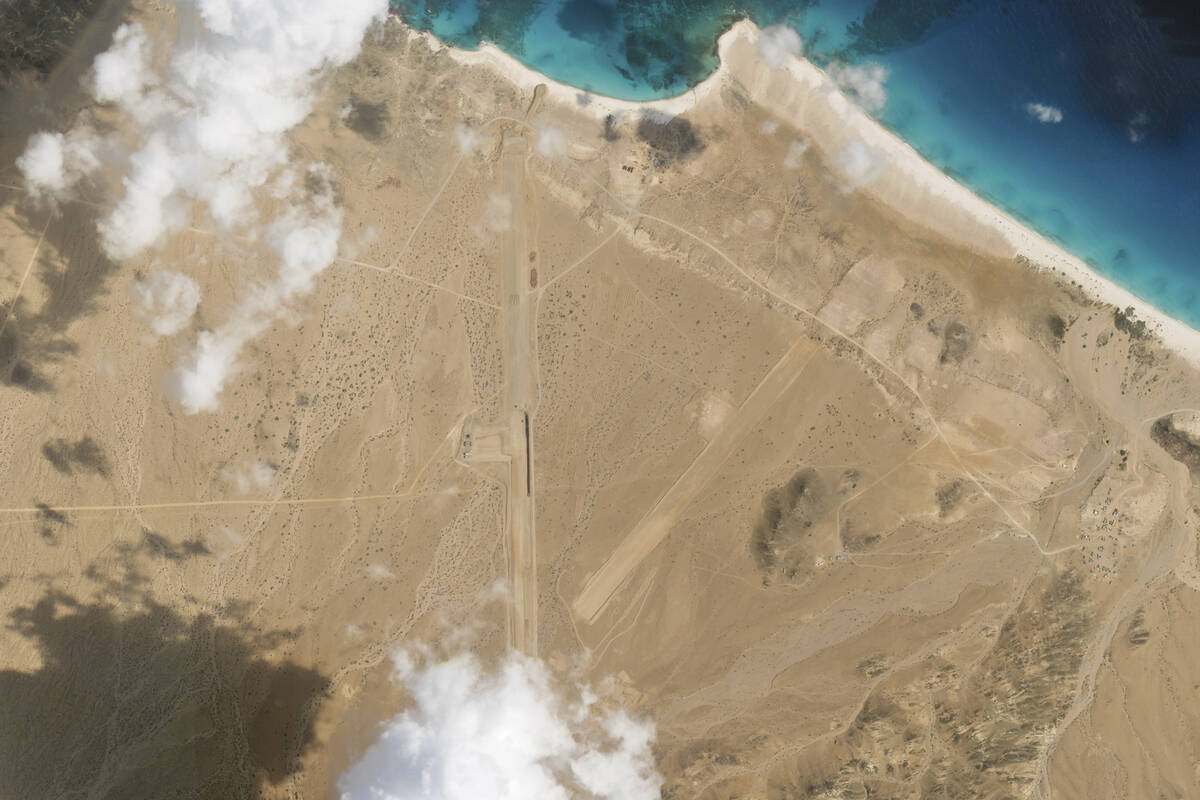 This satellite photo captured by Planet Labs PBC shows the construction of an airstrip on Abd a ...