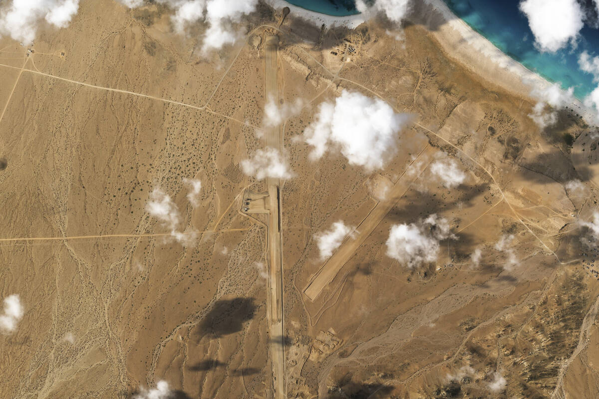 This satellite photo captured by Planet Labs PBC shows the construction of an airstrip on Abd a ...