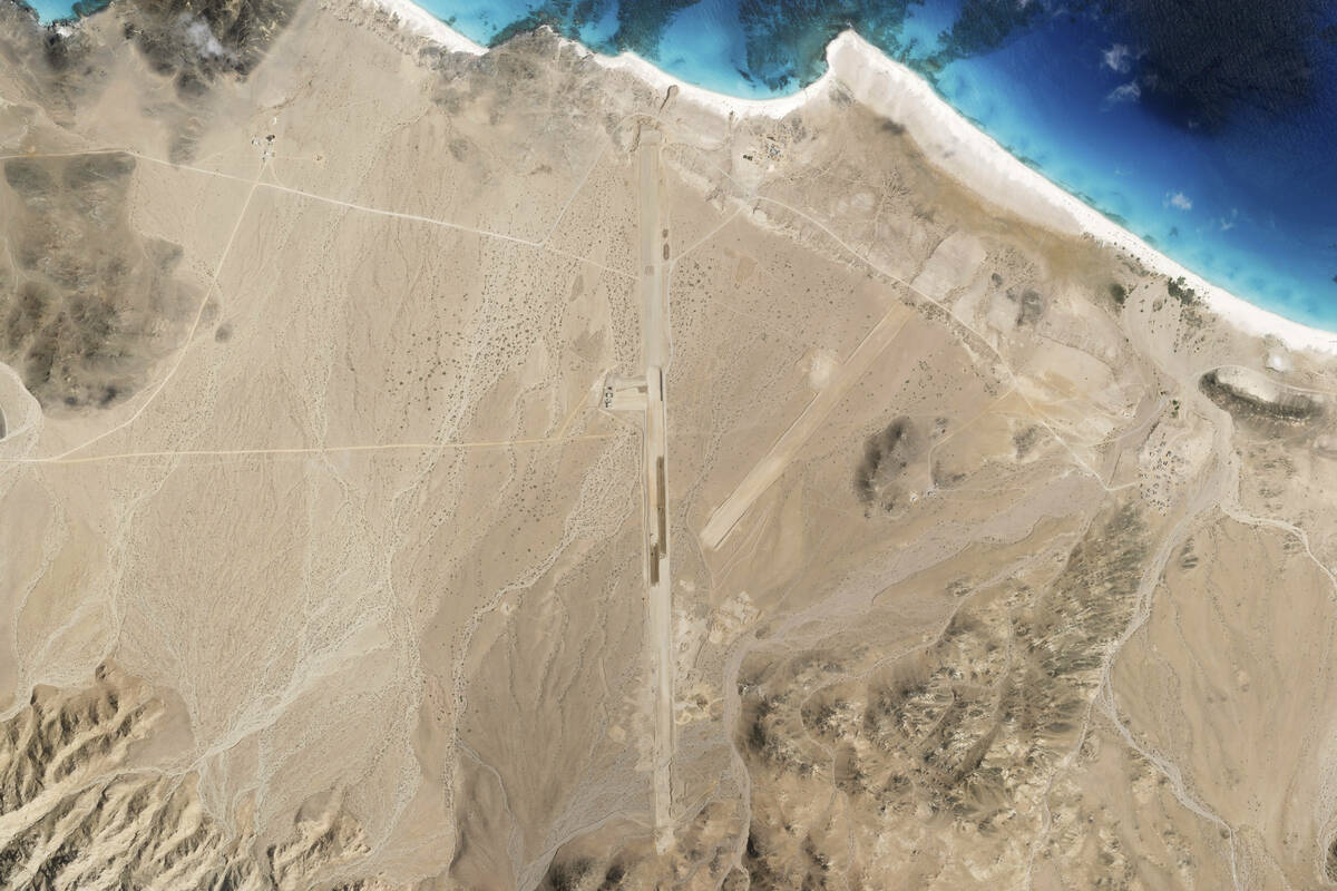 This satellite photo captured by Planet Labs PBC shows the construction of an airstrip on Abd a ...