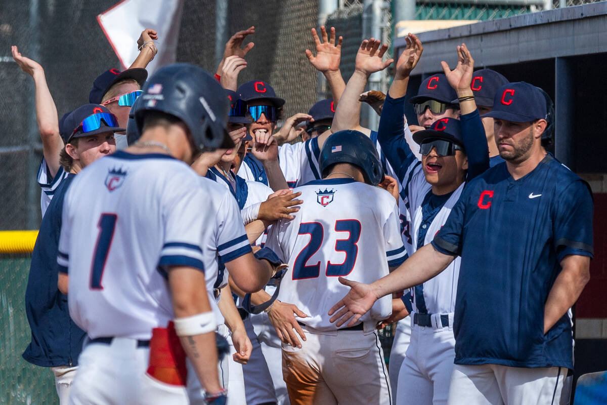 Coronado players celebrate another run against Desert Oasis during their NIAA baseball game at ...