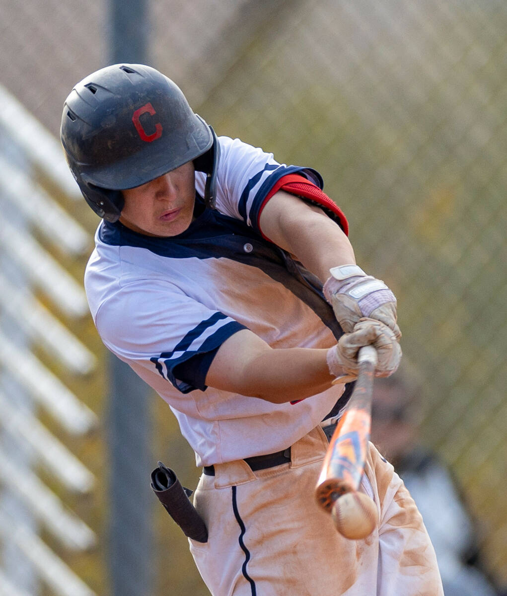 Coronado runner Jackson Thomsen (7) connects on a pitch by Desert Oasis during their NIAA baseb ...