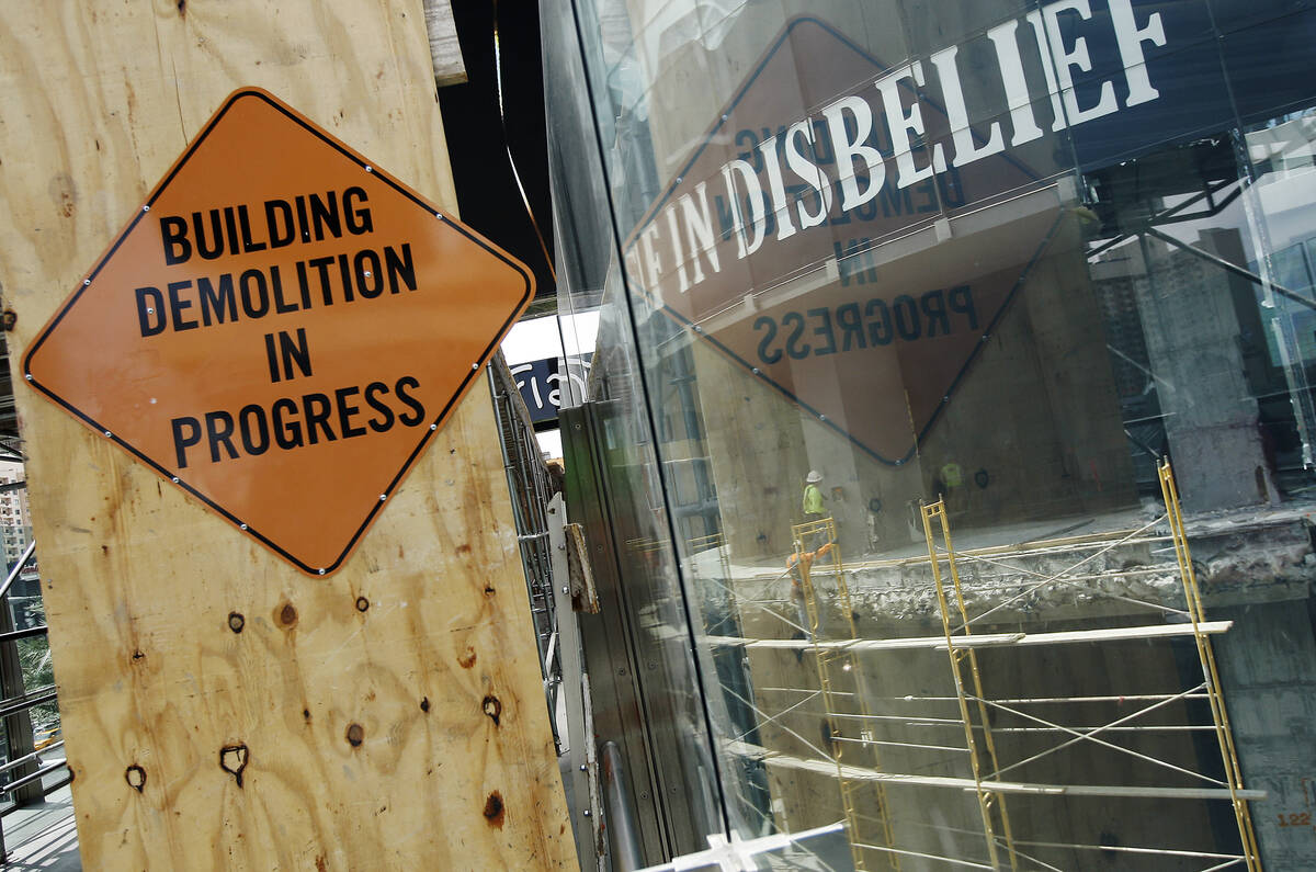 A sign notifying tourists is seen on a walkway next to the Harmon Hotel at City Center as it ge ...