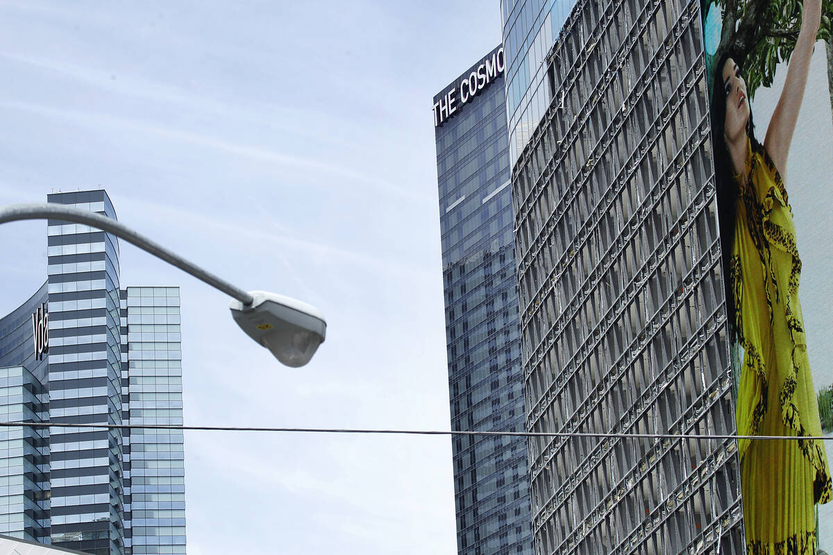 The south side of the Harmon Hotel at City Center, right, is seen while in the process of being ...