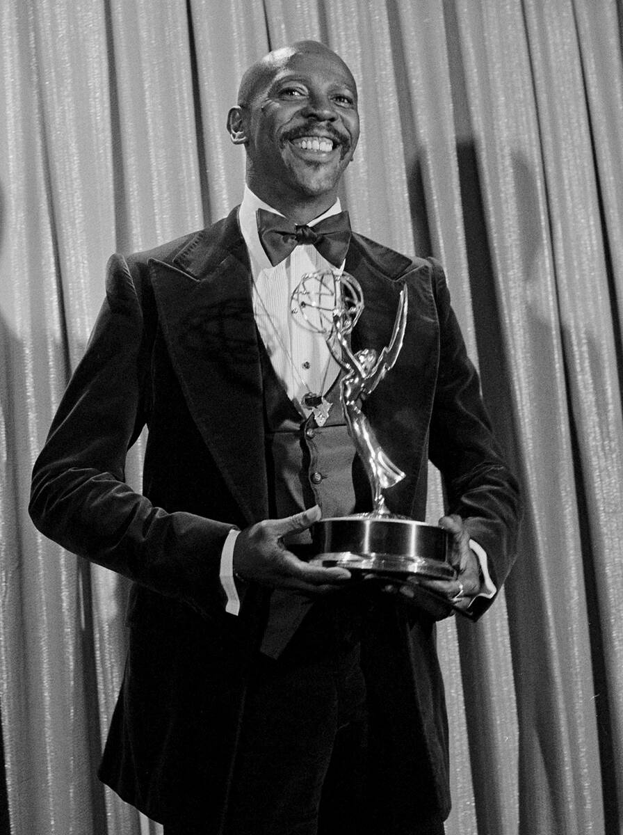 FILE - Louis Gossett Jr., poses with the Emmy he received for his role in the TV drama "Ro ...