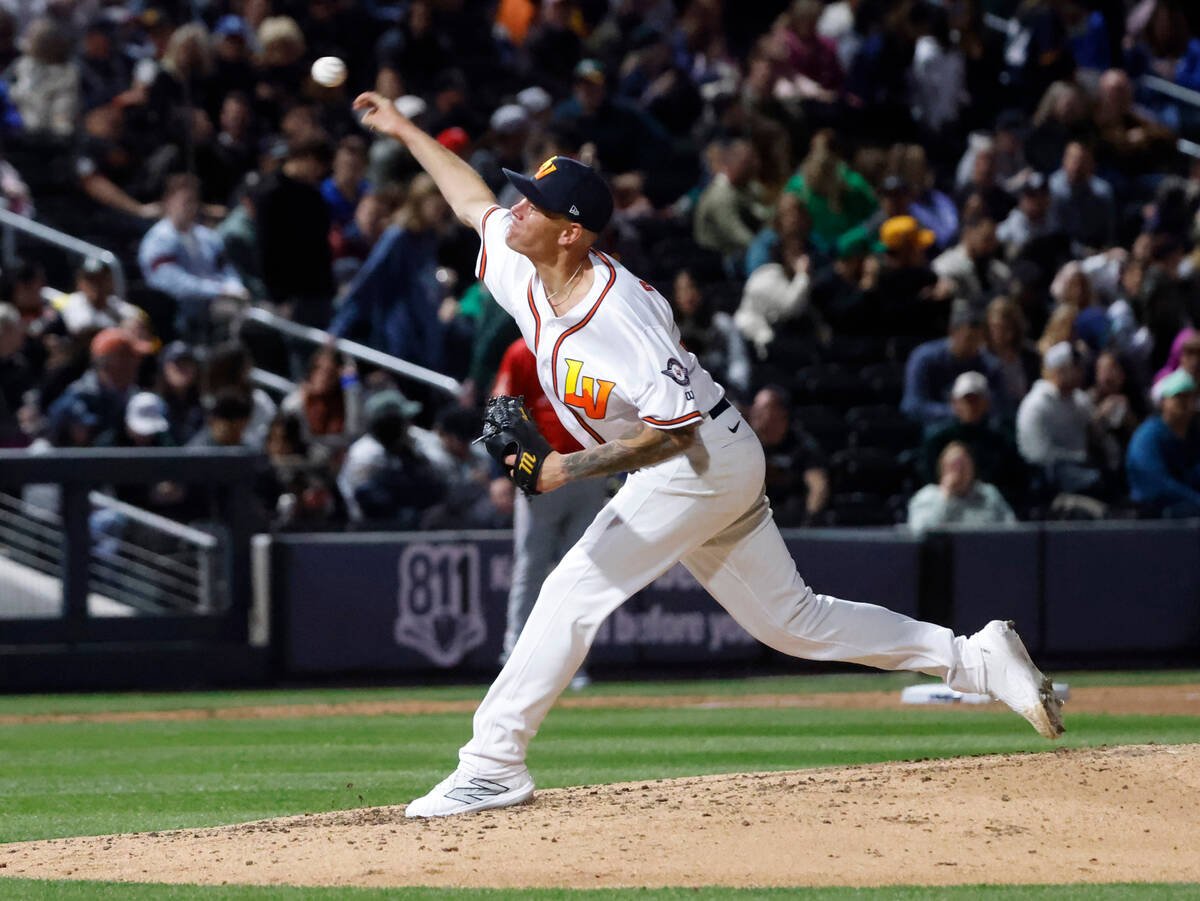 Aviators pitcher Aaron Brooks delivers against Reno Aces during the home opener game at the Las ...