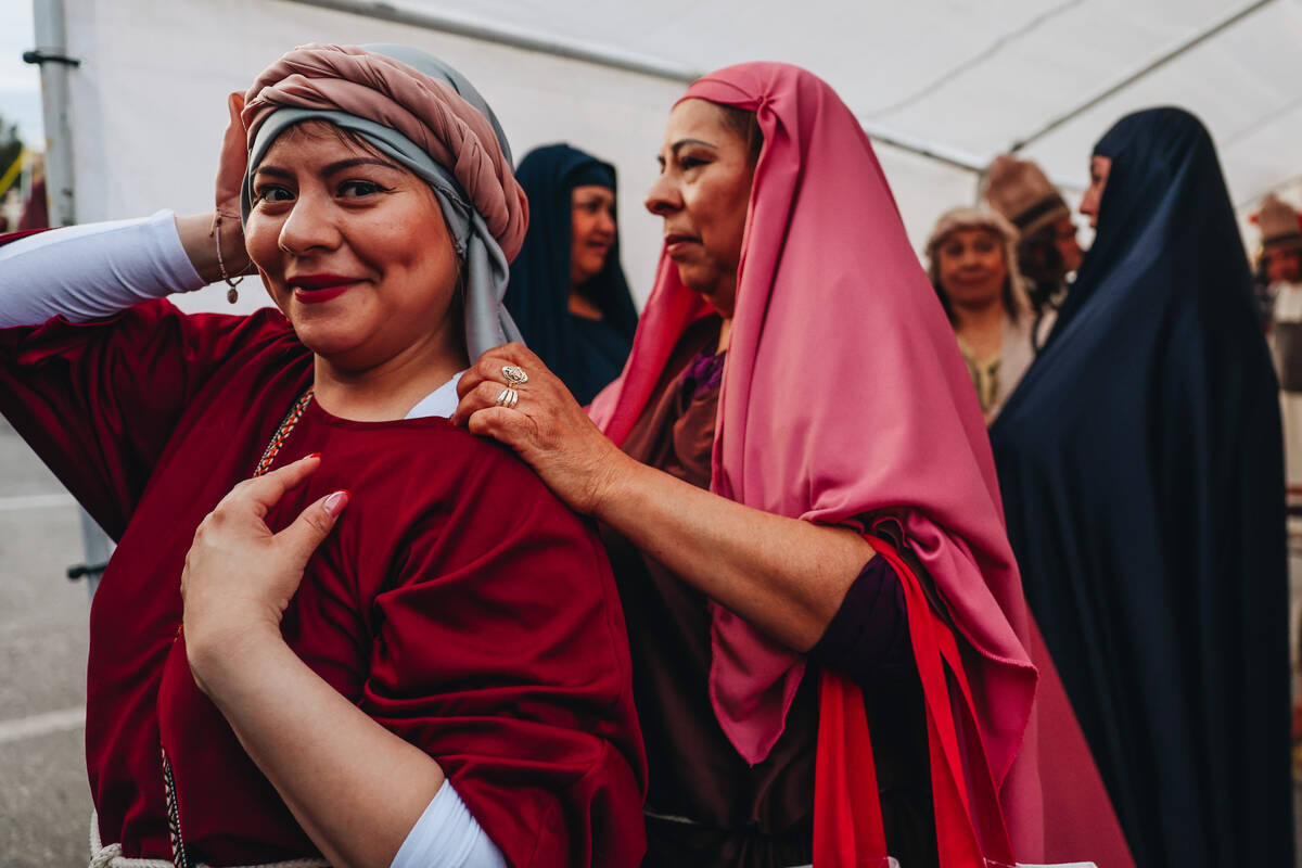 Actors get ready before the Stations of the Cross are acted out during a live performance for G ...