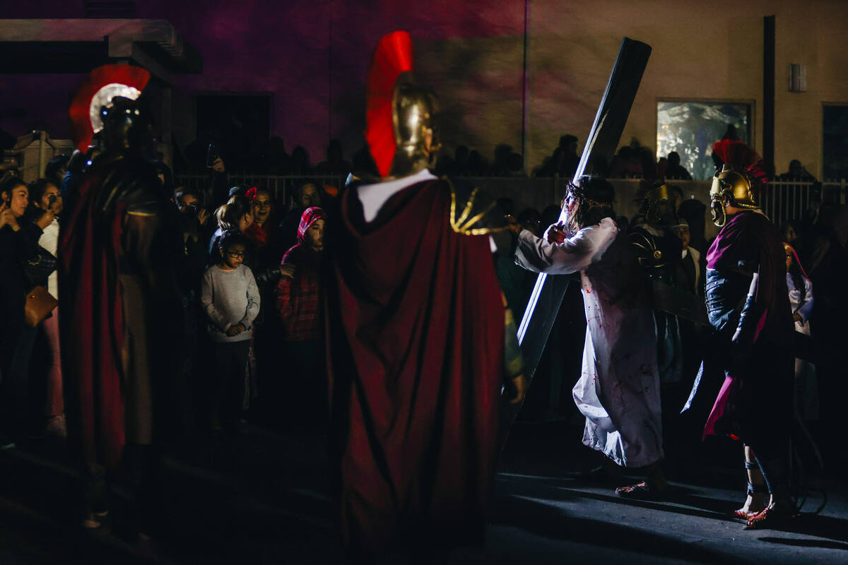 The Stations of the Cross are acted out during a live performance for Good Friday at St. Bridge ...