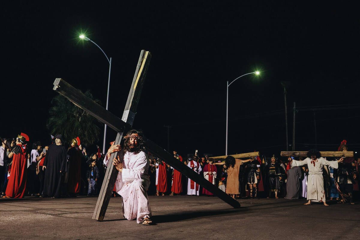 The Stations of the Cross are acted out during a live performance for Good Friday at St. Bridge ...