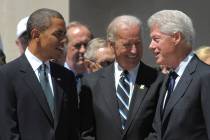 Left to right, then President Barack Obama, Vice President Joe Biden, and former president Bill ...