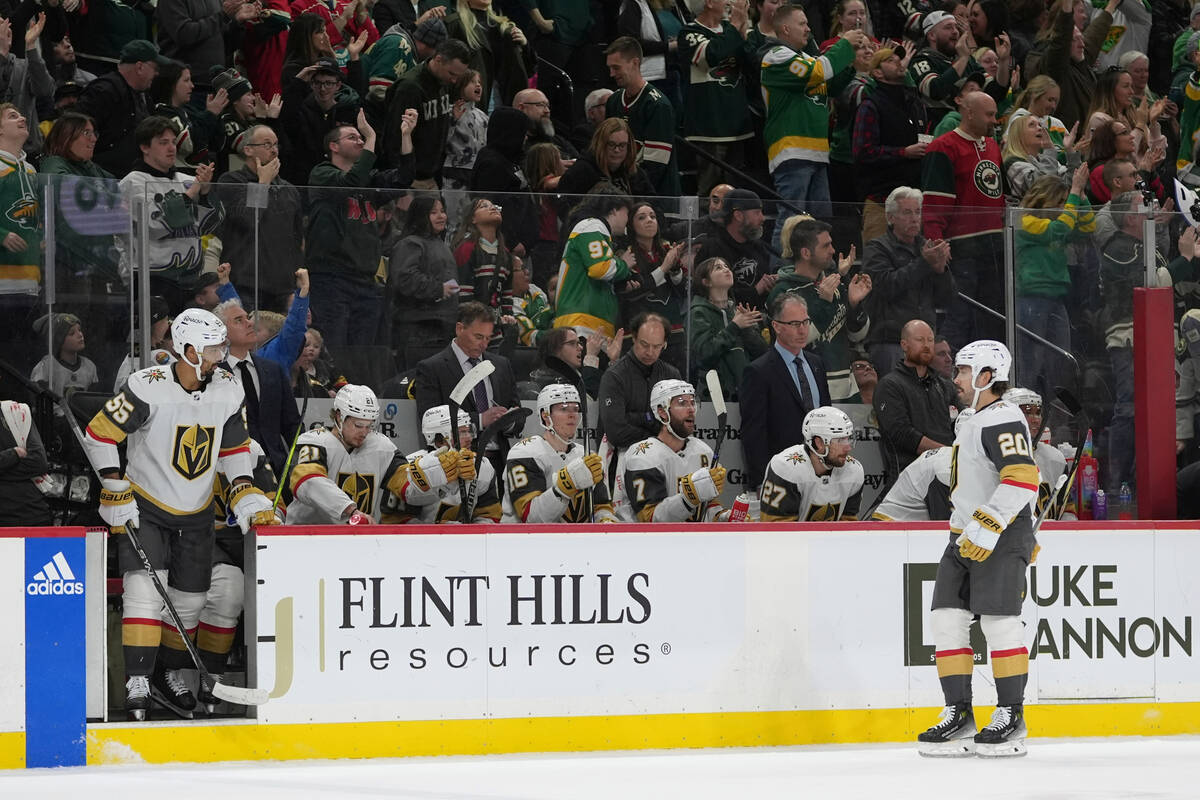 Vegas Golden Knights players react after a goal scored by Minnesota Wild left wing Kirill Kapri ...