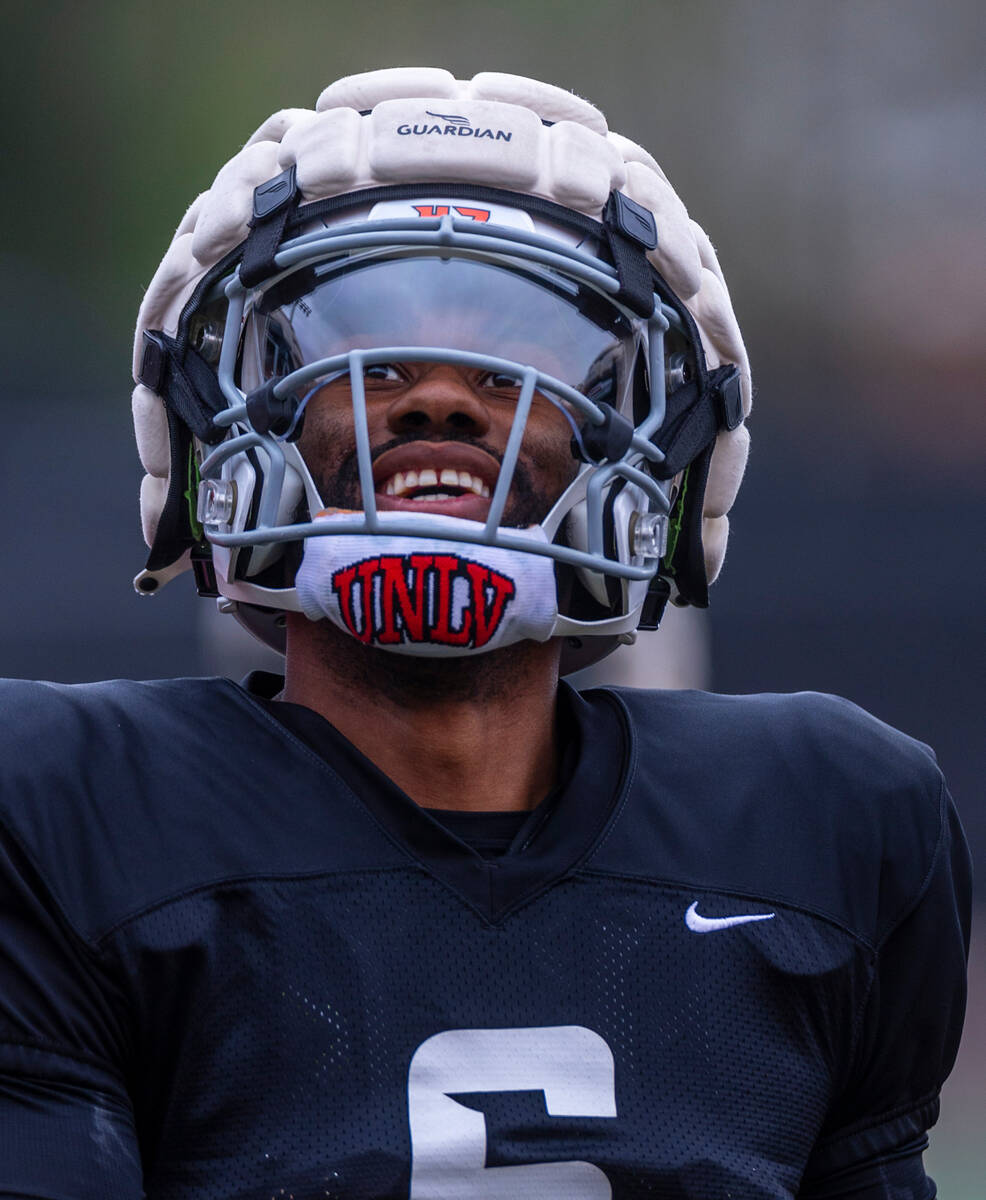 UNLV quarterback Hajj-Malik Williams (6) looks up and smiles during spring football practice at ...