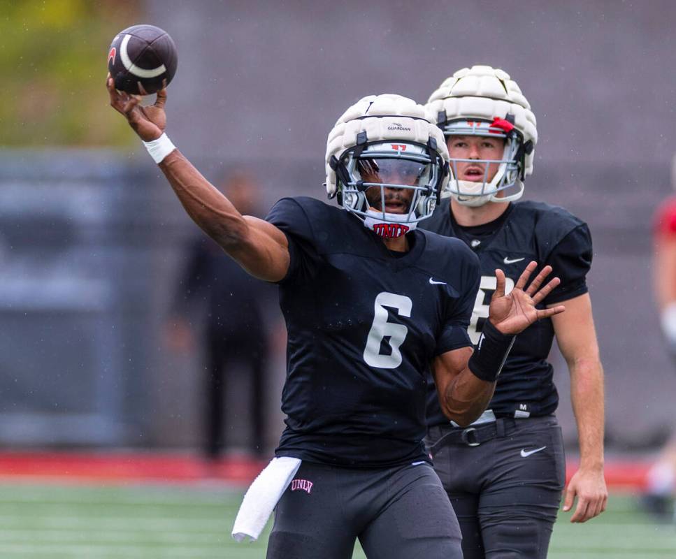 UNLV quarterback Hajj-Malik Williams (6) releases a pass to a receiver during spring football p ...