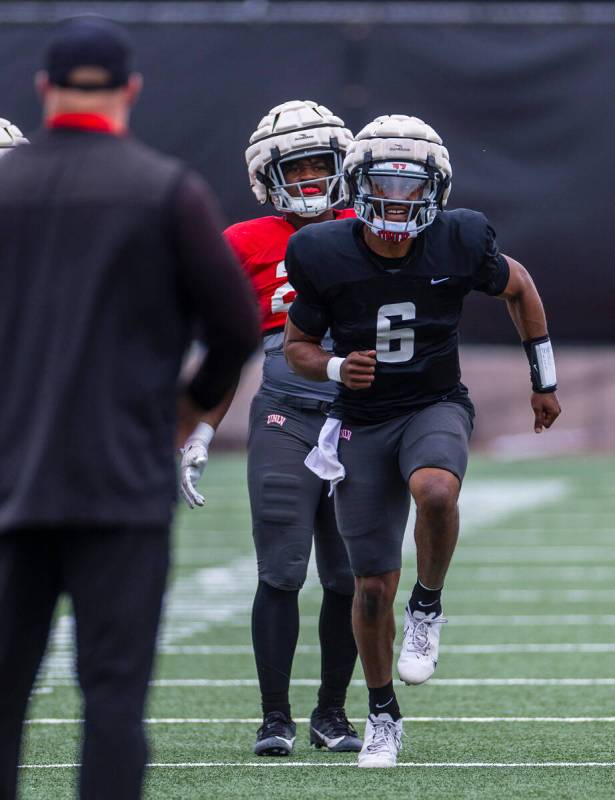 UNLV quarterback Hajj-Malik Williams (6) runs with high knees during spring football practice a ...