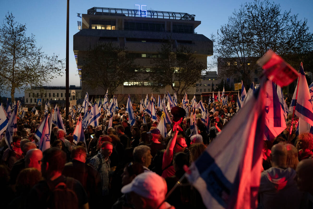 Tens of thousands of protesters pressure Israeli prime minister