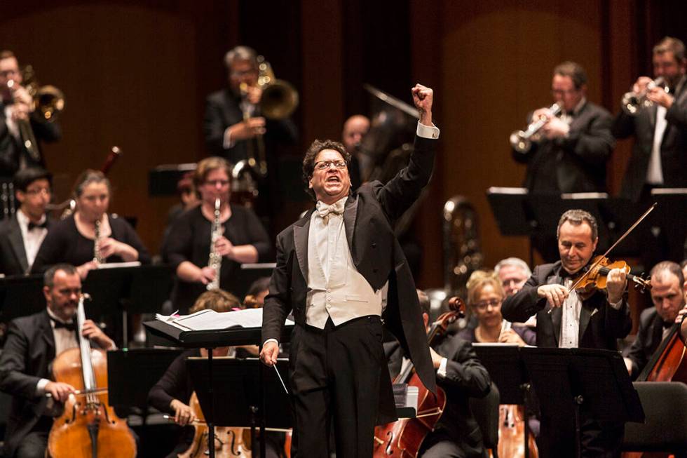 Music Director Donato Cabrera salutes the audience before the start of a performance by the Las ...