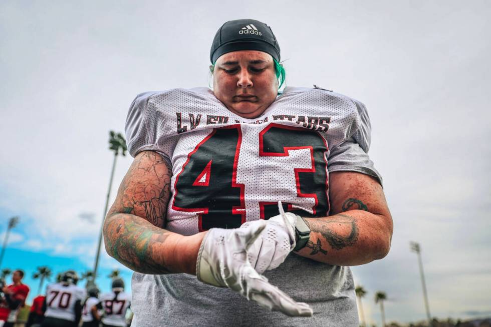 Las Vegas Silver Stars player Brittaney Warren puts her gloves on during a practice at Faith Lu ...