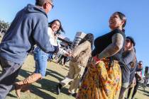 Fawn Douglas, a member of the Las Vegas Paiute Tribe, leads a tribal group dance at the Indigen ...